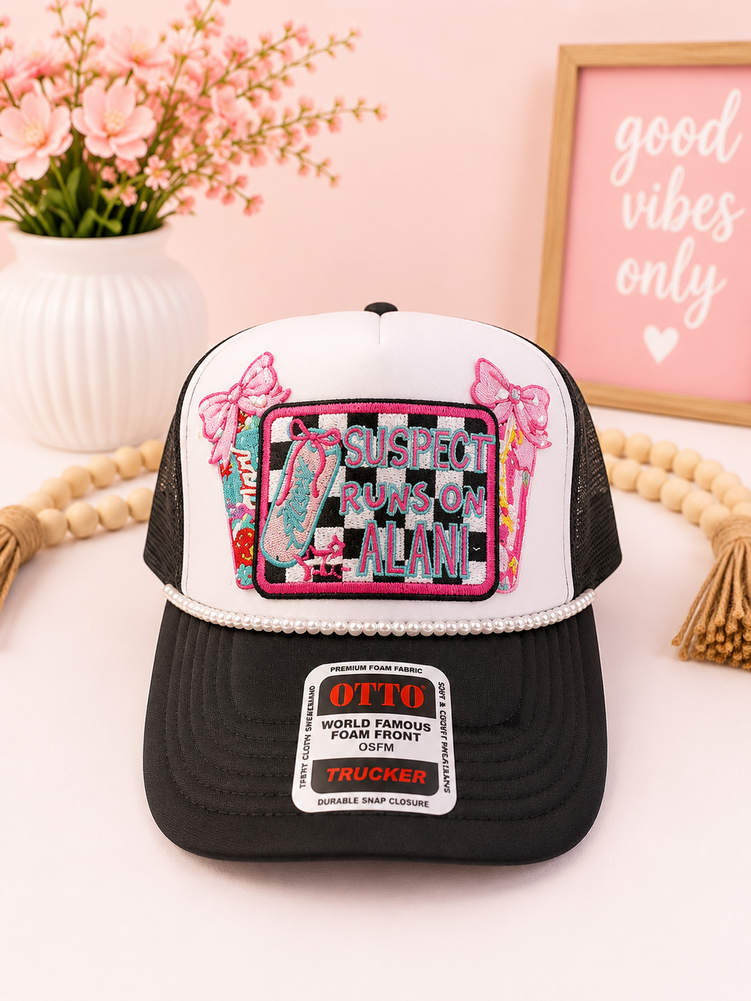 Suspect runs on Alani Trucker Hat